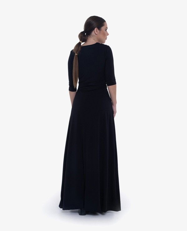 Cuplé MAXI VESTIDO NEGRODE PUNTO CON NUDO FRONTAL Y MANGAS TRES CUARTOS Devoluciones gratuitas
