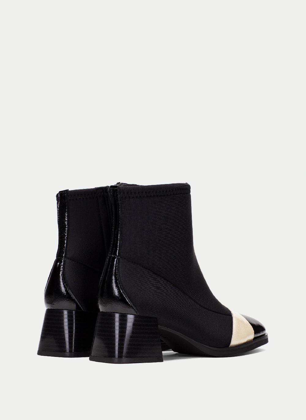 Hispanitas Botin milan negro-milk Ahorra y exporta