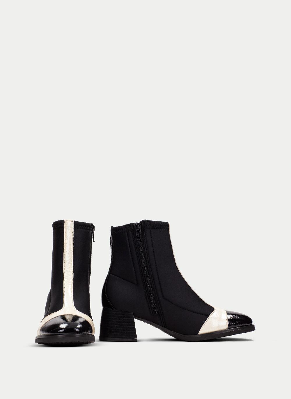 Hispanitas Botin milan negro-milk Ahorra y exporta