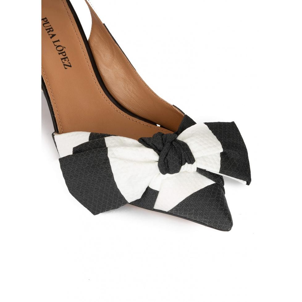pura lópez Zapatos de punta fina y tacón medio en blanco y negro con lazo Ofertas de temporada