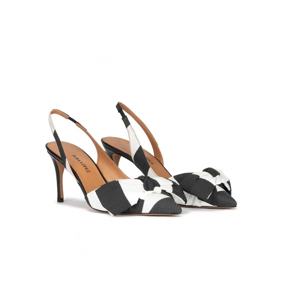 pura lópez Zapatos de punta fina y tacón medio en blanco y negro con lazo Ofertas de temporada
