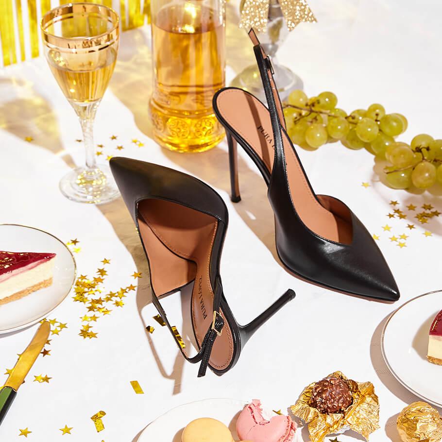 pura lópez Slingbacks de tacón alto con escote asimétrico en piel color negro Tienda