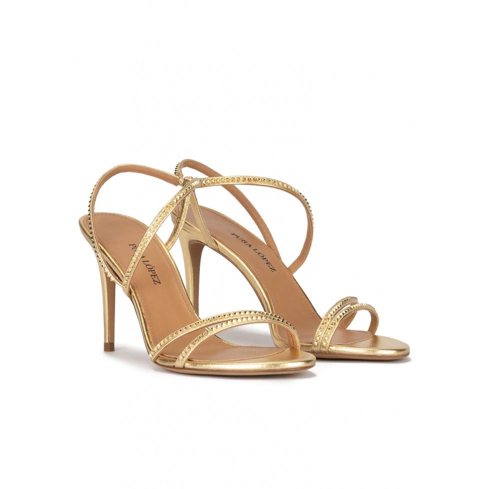 pura lópez Sandalias doradas de piel con tacón alto fino COMPRAR AHORA